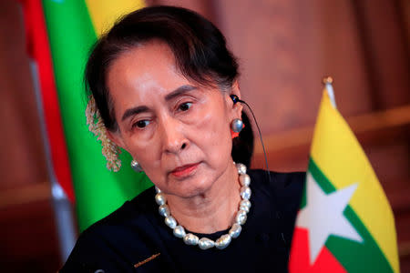 FILE PHOTO: Myanmar's State Counsellor Aung San Suu Kyi attends the joint news conference of the Japan-Mekong Summit Meeting at the Akasaka Palace State Guest House in Tokyo, Japan October 9, 2018. Franck Robichon/Pool via Reuters/File Photo