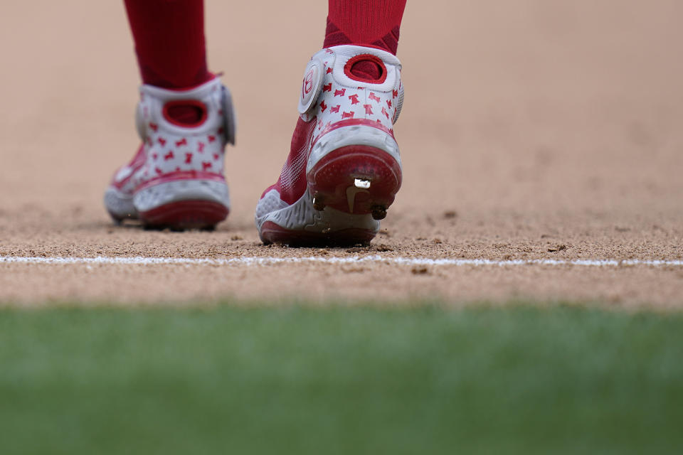 Philadelphia Phillies shortstop Didi Gregorius walks on the field between innings of the first game of a baseball doubleheader against the Washington Nationals, Friday, June 17, 2022, in Washington. (AP Photo/Patrick Semansky)