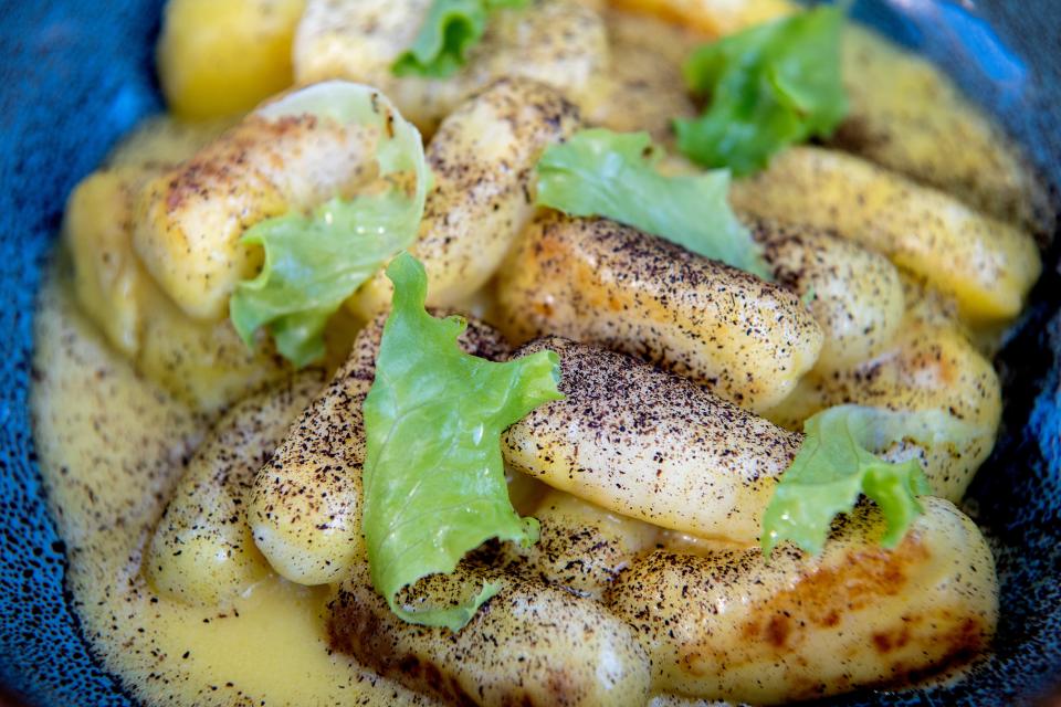 Gnocchi with huancaina and black lime powder from Milton's in Black Mountain.