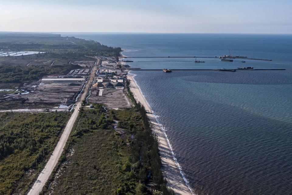 The construction site of the Kalimantan Industrial Park Indonesia (KIPI) is visible in Mangkupadi, North Kalimantan, Indonesia on Thursday, Aug. 24, 2023. The vast industrial park being built on the tropical island of Borneo that has attracted billions of dollars in foreign and domestic investment is damaging the environment in an area where endangered animals live and migrate. (AP Photo/Yusuf Wahil)