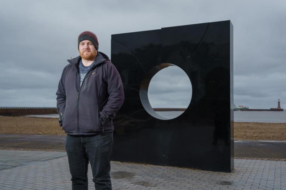 The Northern Echo: University of Sunderland engineering student John Race at the 'C' sculpture on Roker seafront, commemorating the place where the Venerable Bede calculated the motion of the sun and the moon to help set the date of Easter