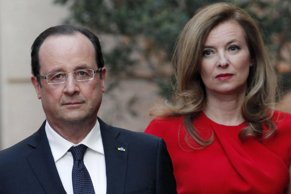 FILE - In this Tuesday, May. 7, 2013, file photo, French President Francois Hollande, left, and his companion Valerie Trierweiler arrive for a state dinner at the Elysee Palace, in Paris as part of Polish President Bronislaw Komorowski's two-day visit to France. The woman considered France's first lady has been hospitalized after a report that the president is having an affair with an actress. Valerie Trierweiler's chief of staff, Patrice Biancone, confirmed Sunday that the 48-year-old journalist who lives with President Francois Hollande has been hospitalized since Friday, Jan. 10, 2014. (AP Photo/Thibault Camus, Pool, File)