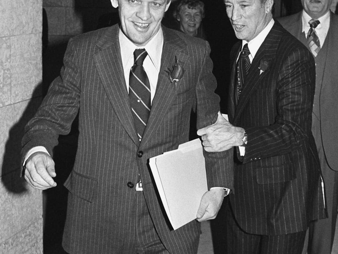 Jean Chrétien, seen here with Prime Minister Pierre Trudeau in 1978, wrote a letter when he was Indian affairs minister, acknowledging there were 'problems' at an Ontario residential school. Chrétien has denied being aware of abuse in the residential school system when he headed the ministry. (Charles Mitchell/The Canadian Press - image credit)