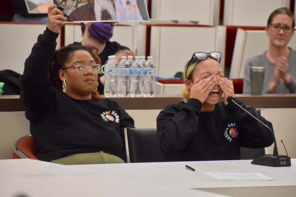 Aysha Waddell, right, is brought to tears as she and her sister, Ahmoni, address Binghamton City Council about the Jan. 1 arrest of their brother, Hamail Waddell.