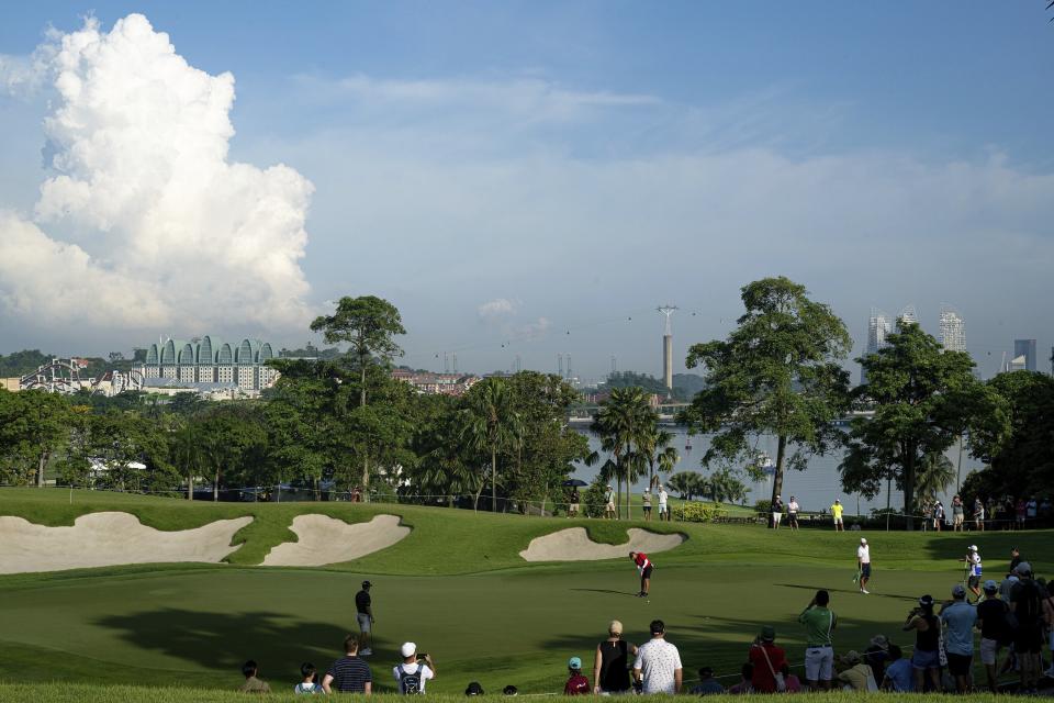 Sergio Garcia putts on the third green during the final round of LIV Golf Singapore at Sentosa Golf Club on Sunday, April 30, 2023, on Sentosa Island in Singapore. (Charles Laberge/LIV Golf via AP)