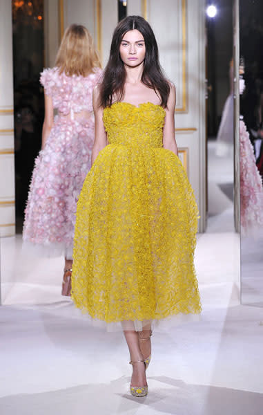 <b>Giambattista Valli SS13 </b><br><br>Mustard yellow was a key trend on the catwalk with models donning dresses and footwear in the shade.<br><br>© Rex