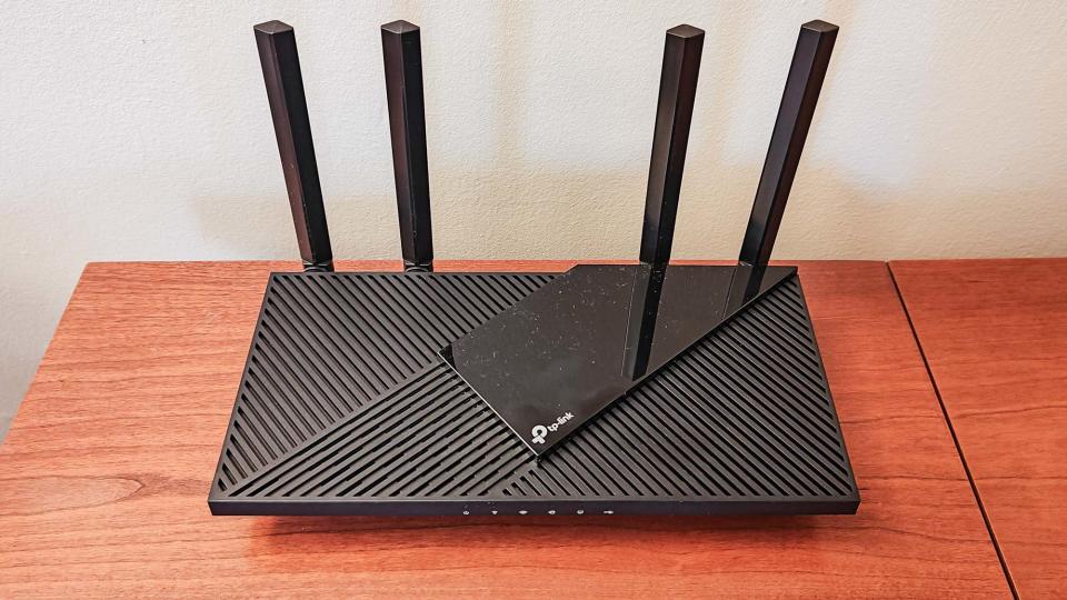 TP- Link Archer AX55 sitting on desk