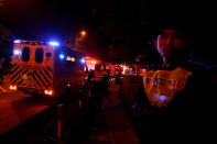 <p>Rescuers arrive after a bus crashed in Hong Kong, China, Feb. 10, 2018. (Photo: Bobby Yip/Reuters) </p>