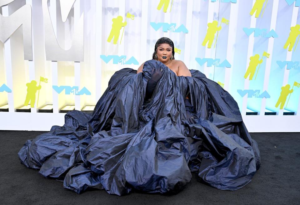 Lizzo 2022 MTV VMAs Sitting on Carpet Black Dress