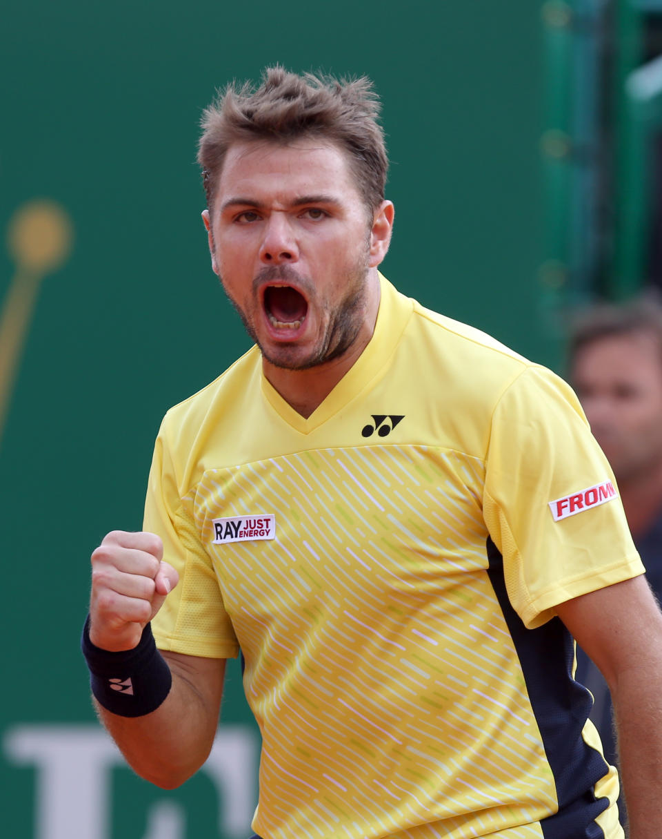 Stanislas Wawrinka of Switzerland celebrates after winning a point against David Ferrer of Spain, during their semifinal match of the Monte Carlo Tennis Masters tournament in Monaco, Saturday, April, 19, 2014. Wavrinka won 6-1, 7-6. (AP Photo/Claude Paris)