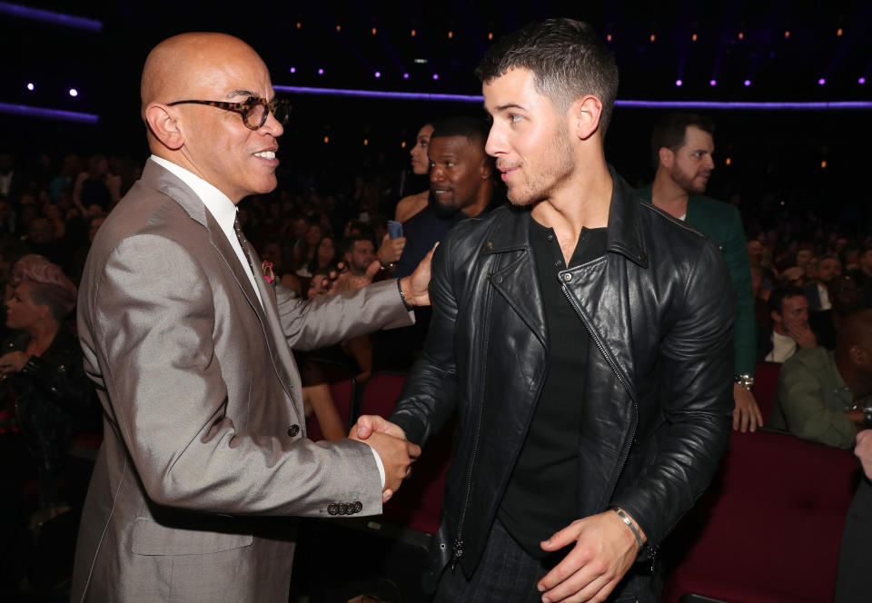 LOS ANGELES, CA - NOVEMBER 19:  Berry Gordy (L) and Nick Jonas during the 2017 American Music Awards at Microsoft Theater on November 19, 2017 in Los Angeles, California.  (Photo by Chris Polk/AMA2017/Getty Images for dcp)