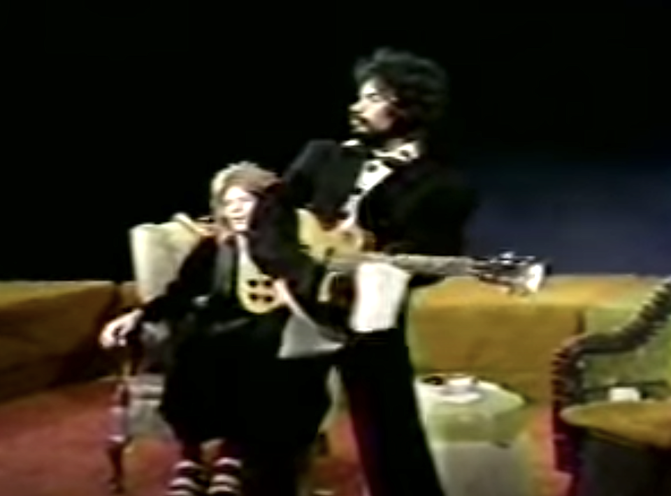 John Oates puts n his penguin jacket for his 