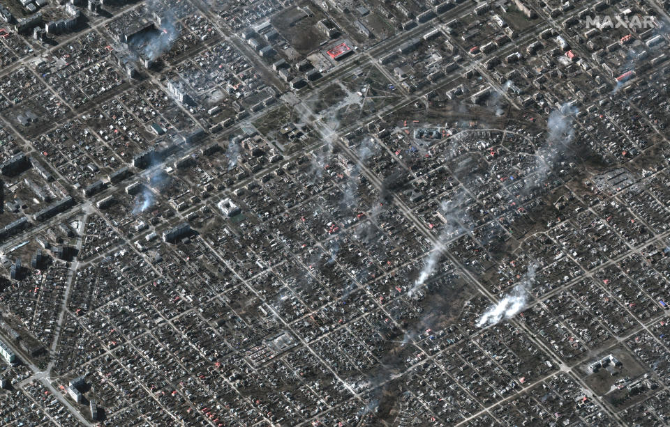 RUSSIANS INVADE UKRAINE -- MARCH 22, 2022:  01 Maxar satellite imagery of the overview of fires burning in residential area, Livoberezhnyi District, Mariupol, Ukraine. 22march2022_wv3.   Please use: Satellite image (c) 2022 Maxar Technologies.