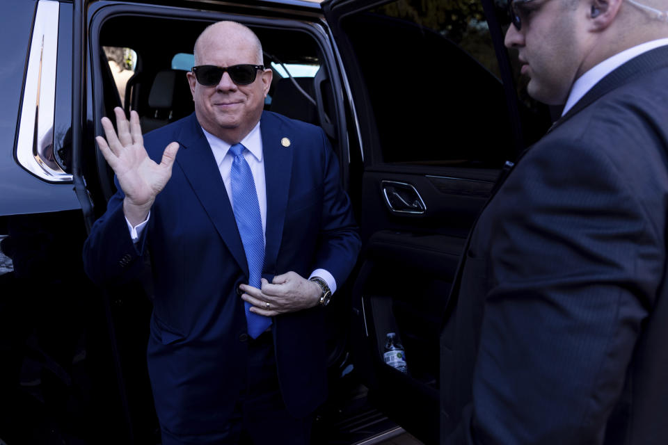 Maryland Gov. Larry Hogan exits his car outside the State House prior to Gov.-elect Wes Moore's inauguration in Annapolis, Md., Wednesday, Jan. 18, 2023. (AP Photo/Julia Nikhinson)