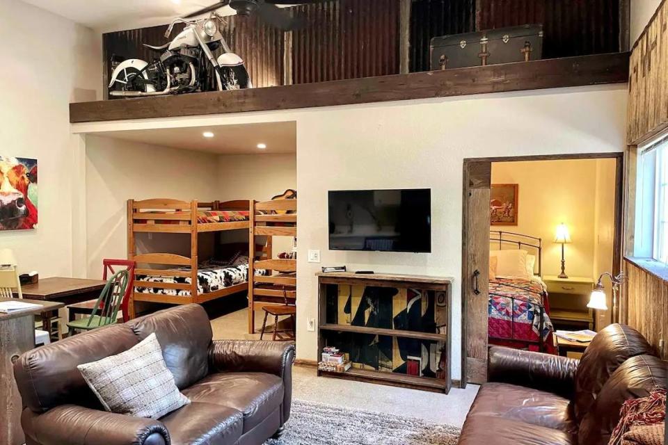 An antique motorcycle with parts cobbled together seven decades ago by Modesto’s Fred C. Atwood, including a 1945 Harley-Davidson engine, is displayed on a 9-foot ledge inside an Airbnb rental in Shingle Springs, Calif.