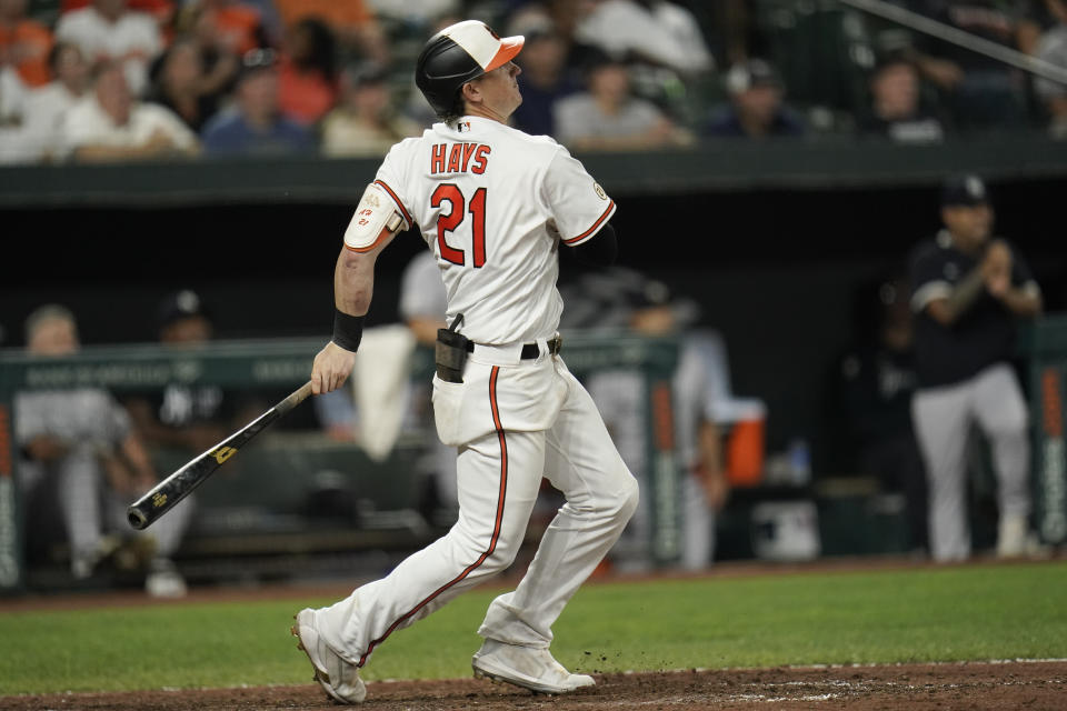 Baltimore Orioles' Austin Hays watches his two-run home run off New York Yankees relief pitcher Chad Green during the eighth inning of a baseball game, Wednesday, Sept. 15, 2021, in Baltimore. (AP Photo/Julio Cortez)