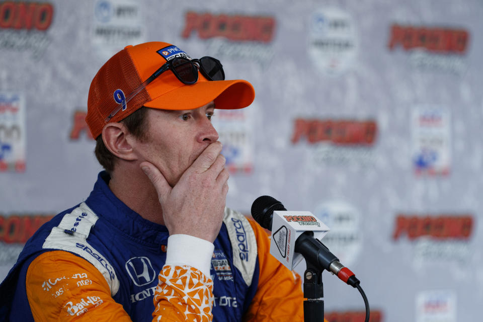 Scott Dixon listens to a question during a news conference for Sunday's IndyCar Series auto race at Pocono Raceway, Saturday, Aug. 17, 2019, in Long Pond, Pa. (AP Photo/Matt Slocum)