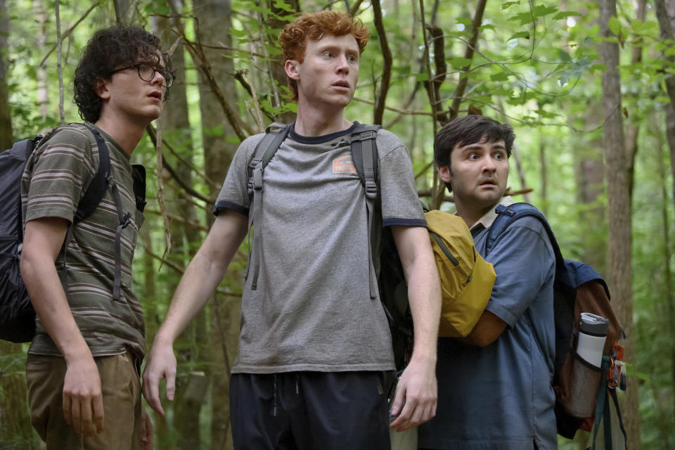 This image released by Peacock shows Martin Herlihy, from left, Ben Marshall and John Higgins in a scene from "Please Don't Destroy: The Treasure of Foggy Mountain." (Anne Marie Fox/Peacock via AP)