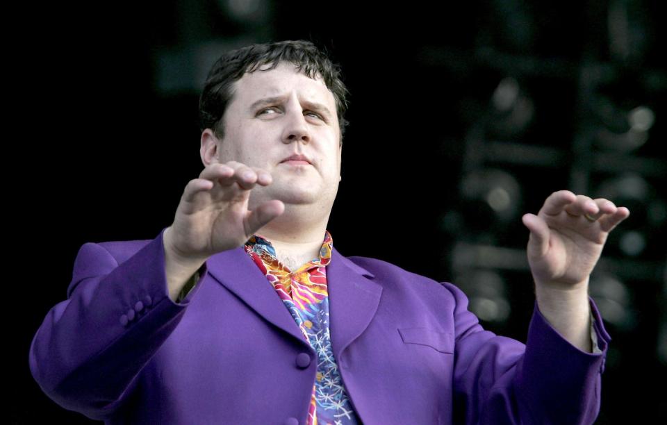 Peter Kay supports Queen performing live on stage at Hyde Park in London.