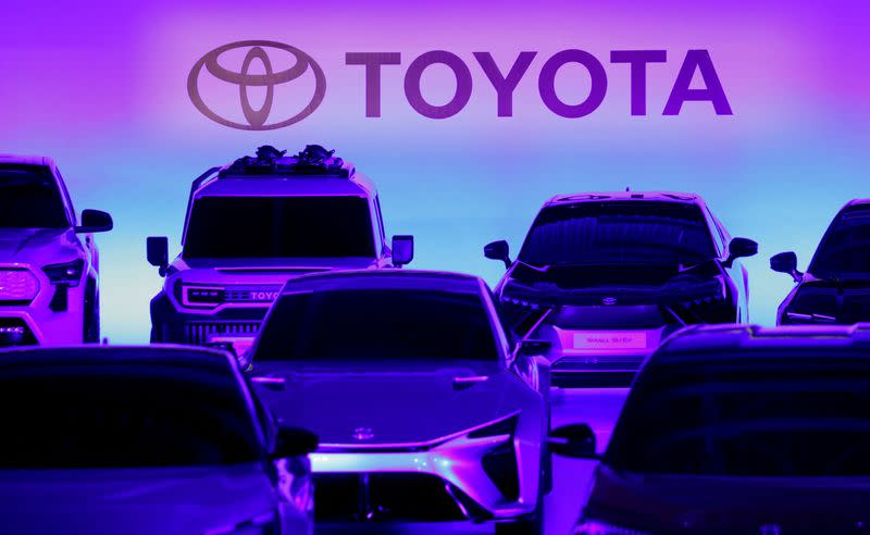 FILE PHOTO: Toyota cars are seen at a briefing on the company's electric vehicle strategy