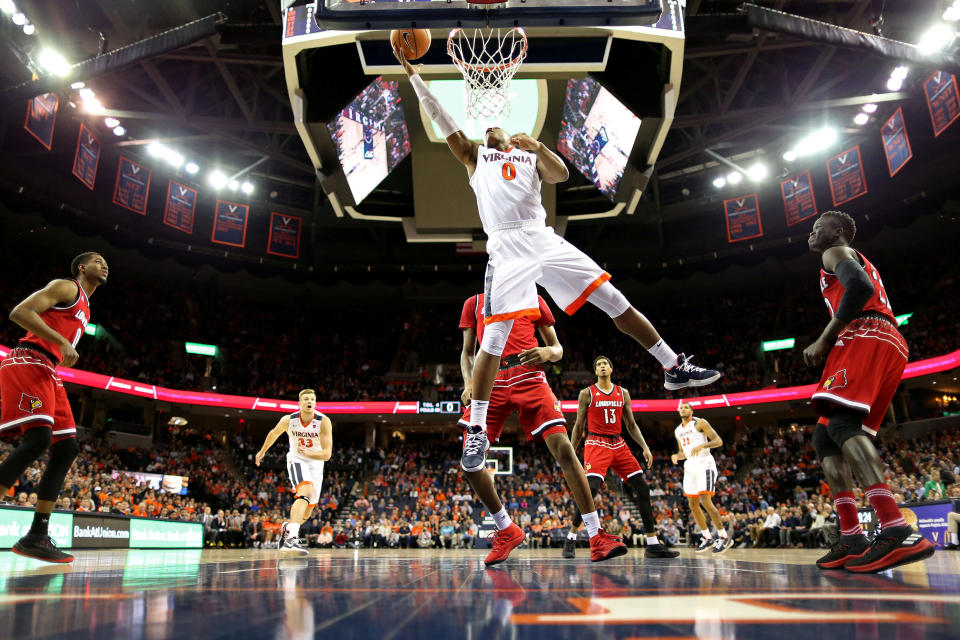 Devon Hall lays it in for two of his 12 points in Virginia’s 74-64 win over Louisville on Wednesday night. (Geoff Burke/USA TODAY Sports)