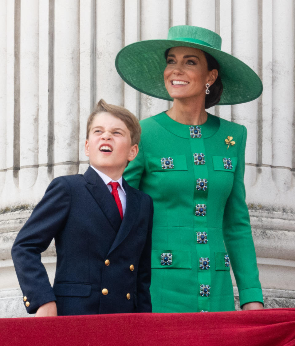 Kate Middleton in green dress and hat and sapphire and diamond earrings at Trooping the Colour