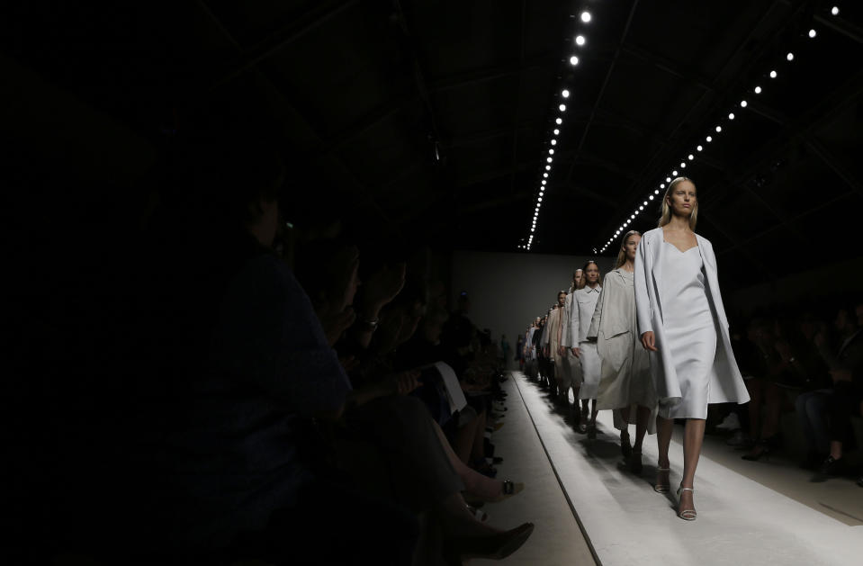 Models wear creations for Max Mara women's Spring-Summer 2014 collection, part of the Milan Fashion Week, unveiled in Milan, Italy, Thursday, Sept. 19, 2013. (AP Photo/Luca Bruno)