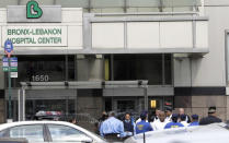 <p>Officials are gathered outside Bronx Lebanon Hospital in New York after a gunman opened fire there on Friday, June 30, 2017. The gunman, identified as Dr. Henry Bello who used to work at the hospital, returned with a rifle hidden under his white lab coat, law enforcement officials said. (AP Photo/Julio Cortez) </p>