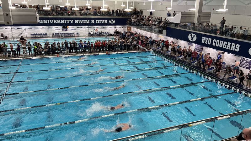 Swimmers compete in a boys 50-meter freestyle preliminary race at the 6A state meet at BYU on Friday, Feb. 23.