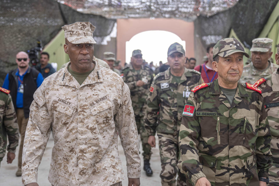 Gen. Michael Langley, USMC, Commander, U.S. Africa Command, center, and Major General Mohammed Berrid, Inspector General of Moroccan Royal Armed Forces, attend the 20th edition of the African Lion military exercise, in Tantan, south of Agadir, Morocco, Friday, May 31, 2024. (AP Photo/Mosa'ab Elshamy)