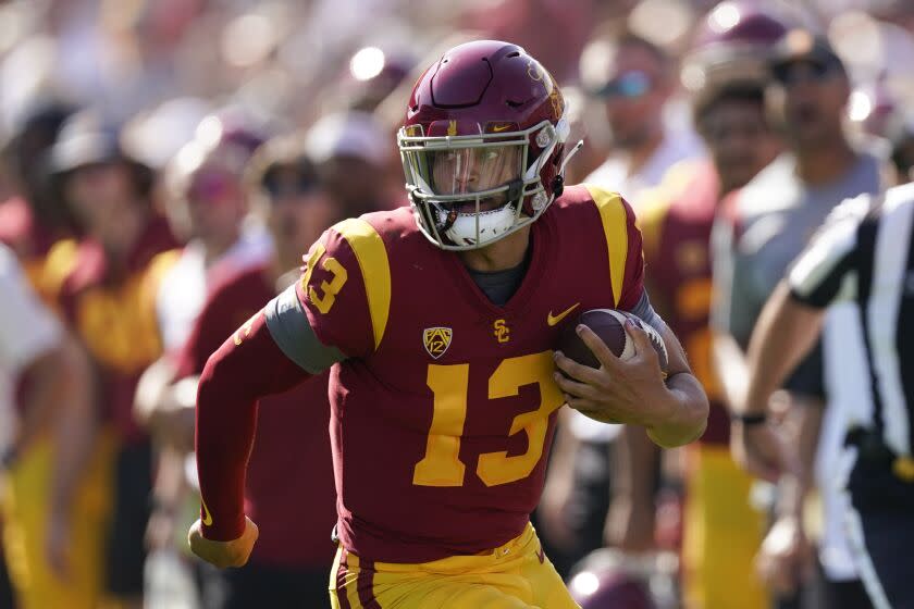 Southern California quarterback Caleb Williams (13) runs the ball.