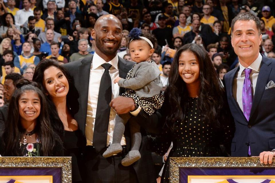 The Bryant family with Lakers executive Rob Pelinka | Andrew D. Bernstein/Getty Images