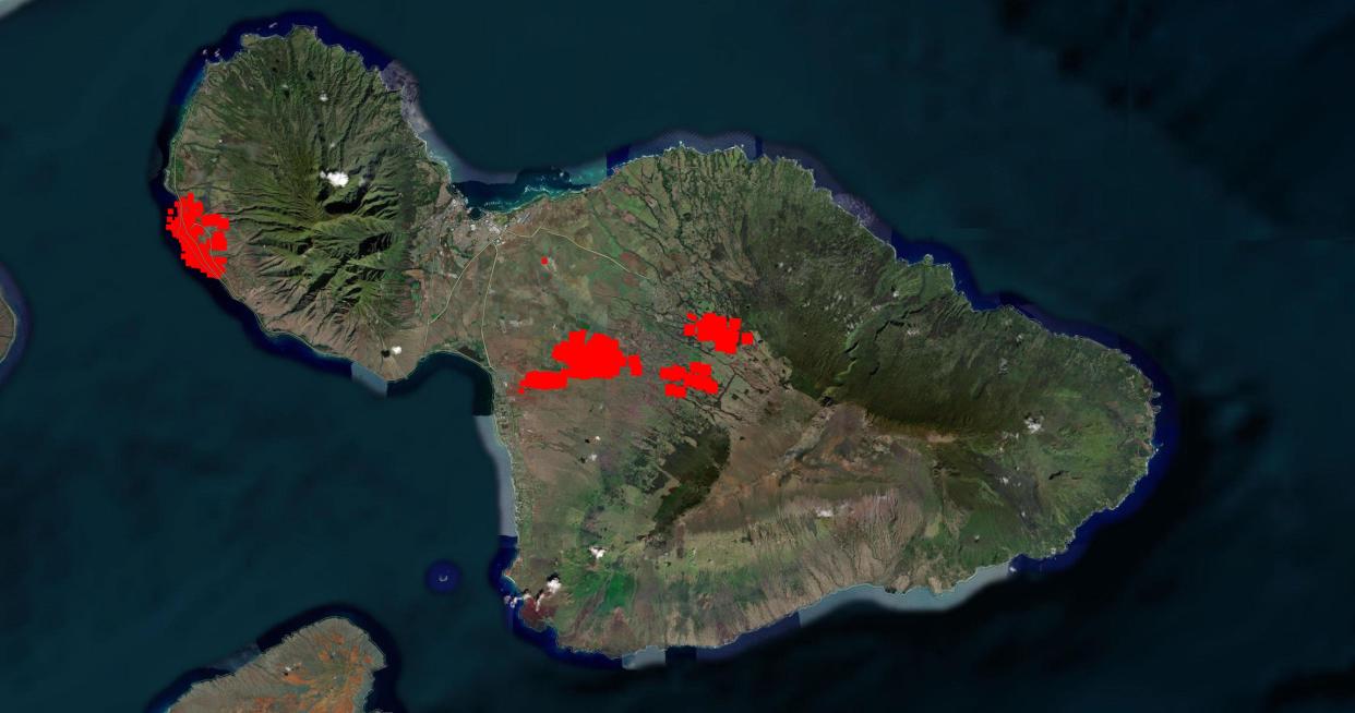 A NASA FIRMS map shows hot spots from wind-fueled fires that forced evacuations and left thousands without power in the last 24 hours.