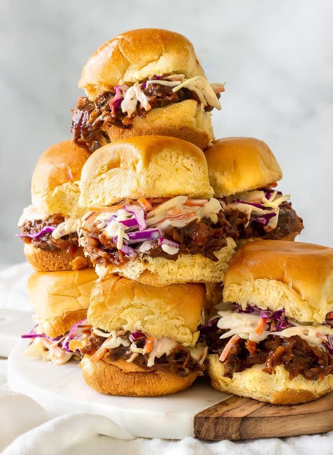 slow cooker bbq pulled beef sandwiches piled high