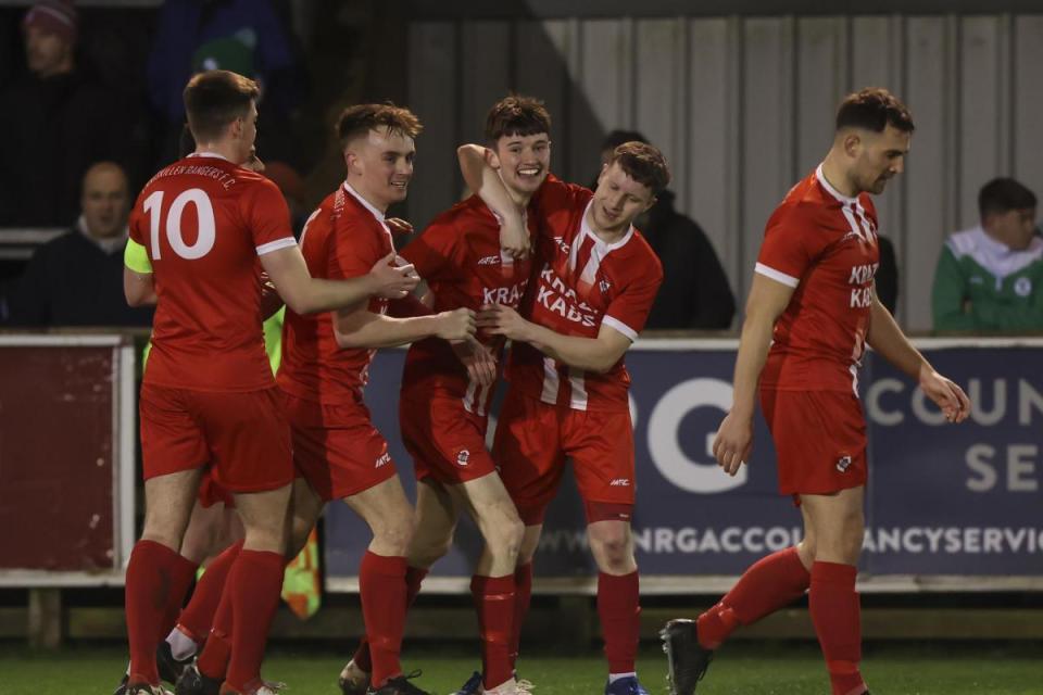 Enniskillen Rangers players celebrate during their semi-final of the Junior Cup against Tummery Athletic. <i>(Image: John McVitty)</i>