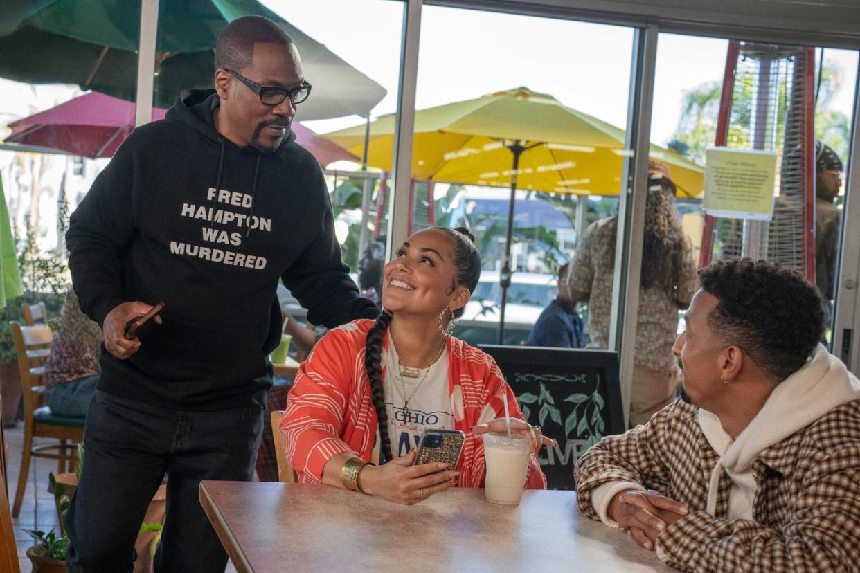 you people l to r eddie murphy as akbar, lauren london as amira and travis bennet as omar in you people cr parrish lewisnetflix © 2023