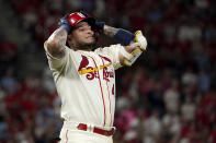 St. Louis Cardinals' Yadier Molina reacts after flying out to end the fourth inning of a baseball game against the San Diego Padres Saturday, Sept. 18, 2021, in St. Louis. (AP Photo/Jeff Roberson)