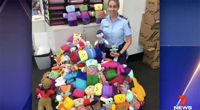 Senior Constable Emma Whitmill launched Em's Friends as a knitting group providing traumatised children in hospital with comforting teddies. Source: 7 News