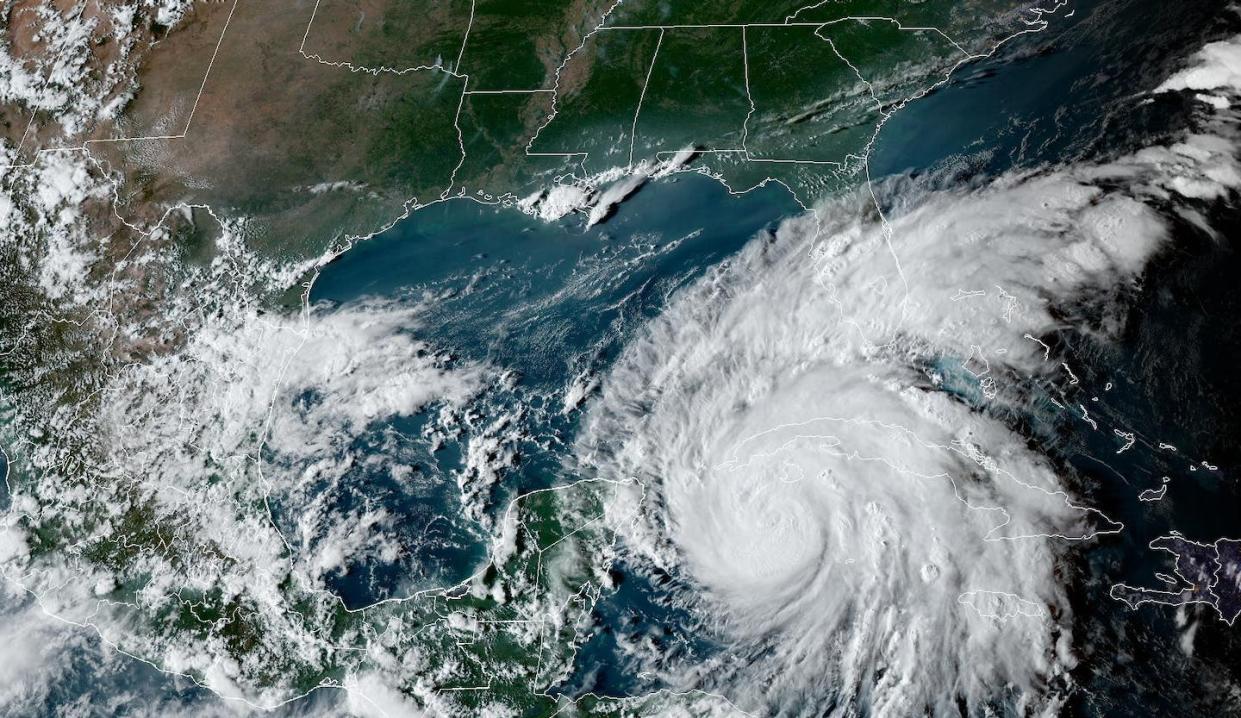 Hurricane Ian gained strength as it headed over warm waters off Cuba on Sept. 26, 2022. <a href="https://cdn.star.nesdis.noaa.gov/GOES16/ABI/CONUS/GEOCOLOR/20222692201_GOES16-ABI-CONUS-GEOCOLOR-2500x1500.jpg" rel="nofollow noopener" target="_blank" data-ylk="slk:NOAA;elm:context_link;itc:0;sec:content-canvas" class="link ">NOAA</a>