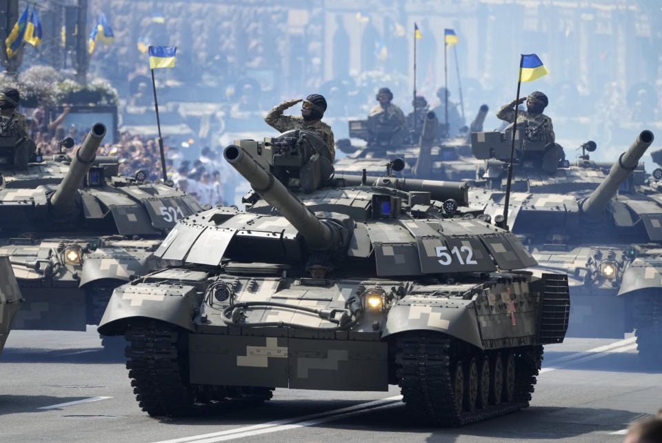 Tanks ride along Khreshchatyk Street, during a military parade to celebrate Independence Day in Kiev, Ukraine, Tuesday, Aug. 24, 2021. (AP Photo/Efrem Lukatsky)