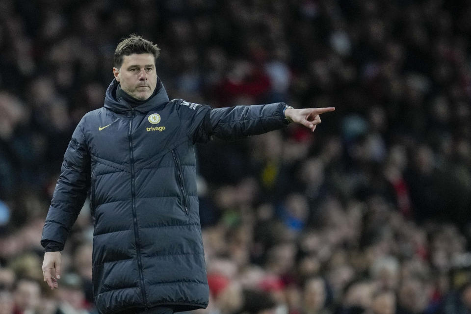 Chelsea's head coach Mauricio Pochettino gives instructions to his players during the English Premier League soccer match between Arsenal and Chelsea at Emirates Stadium in London, Tuesday, April 23, 2024. (AP Photo/Kin Cheung)