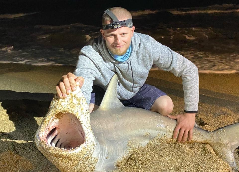 Here's Tyler, from Oak Hill, with a 6-foot blacktip he brought to shore with the help of NSB Shark Hunters.