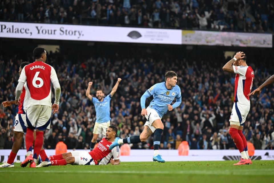 John Stones turns to celebrate after scoring Manchester City’s leveller  (Getty Images)