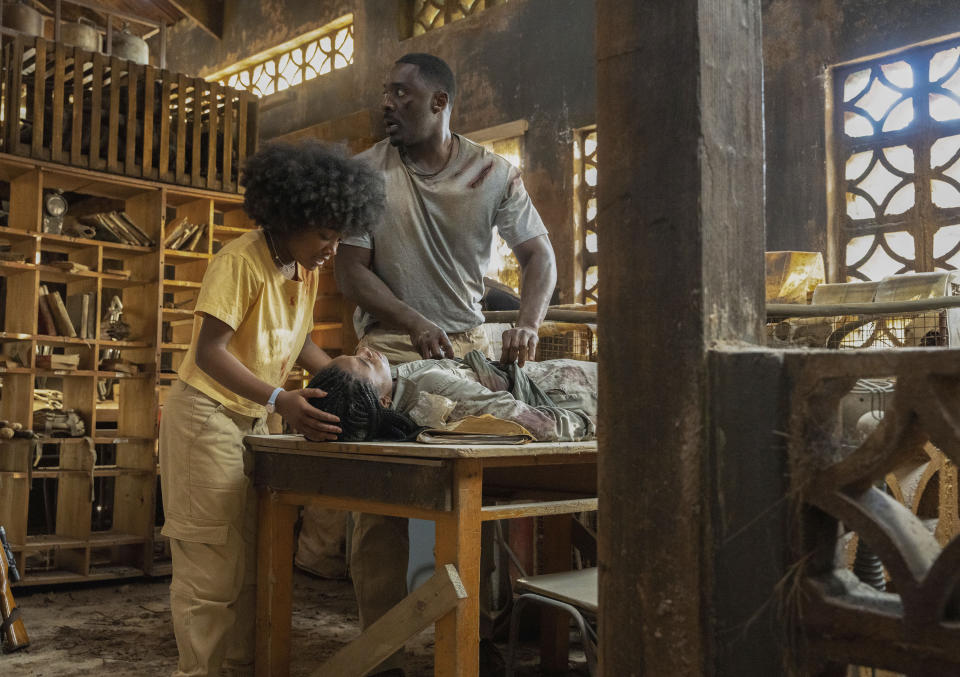 This image released by Universal Pictures shows Leah Jeffries, clockwise from left, Idris Elba and (Iyana Halley in a scene from "Beast." (Lauren Mulligan/Universal Pictures via AP)