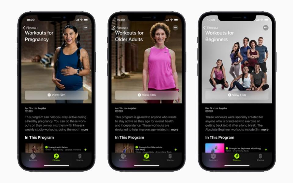 Three smartphones show Apple's new app at different stages, with pictures of attractive yet relatable people wearing refined yet down to earth looking exercise gear, under the headings "Workouts for Pregnancy", "Workouts for Older Adults", "Workouts for Beginners" - Apple