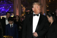 Former President Donald Trump arrives for a New Years Eve party at Mar-a-Lago, in Palm Beach, Fla., Saturday, Dec. 31, 2022. (AP Photo/Lynne Sladky)