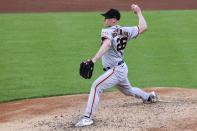 San Francisco Giants' Anthony DeSclafani throws during the second inning of a baseball game against the Cincinnati Reds in Cincinnati, Tuesday, May 18, 2021. (AP Photo/Aaron Doster)