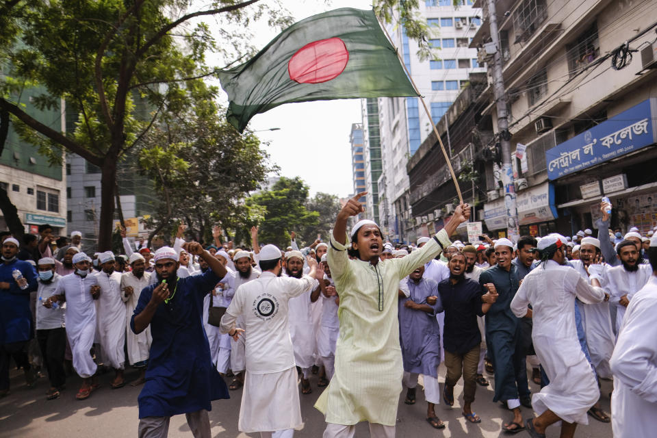 Bangladeshi Muslims protesting the French president’s support of secular laws allowing caricatures of the Prophet Muhammad march to lay siege on the French Embassy in Dhaka, Bangladesh, Monday, Nov.2, 2020. (AP Photo/Mahmud Hossain Opu)