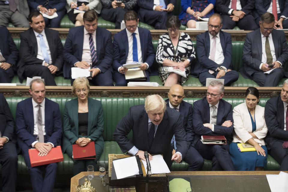 In this image released by the House of Commons, Britain's Prime Minister Boris Johnson speaks in the House of Commons, London, Tuesday Sept. 3, 2019. British Prime Minister Boris Johnson suffered key defections from his party Tuesday, losing a working majority in Parliament and weakening his position as he tried to prevent lawmakers from blocking his Brexit plans. (Jessica Taylor/House of Commons via AP)