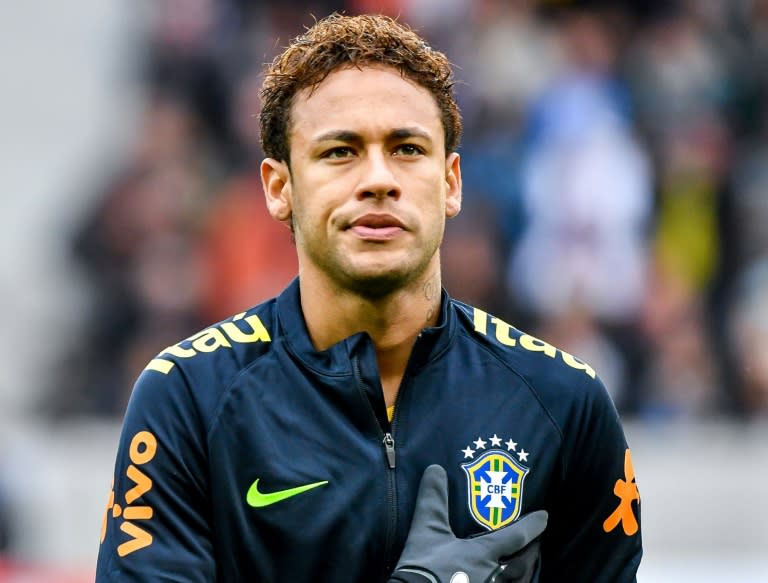 Brazil's forward Neymar sings the national anthem ahead of a friendly football match against Japan at The "Pierre Mauroy " Stadium in Villeneuve d'Ascq on November 10, 2017